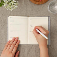 Load image into Gallery viewer, 2027 Weekly Block Planner Poche A6 | Hightide USA Inc.