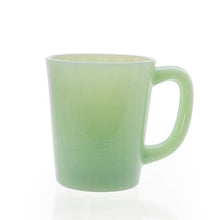 Load image into Gallery viewer, Smooth light green glass with handle pictured on white background; Light shown reflecting off of handle 