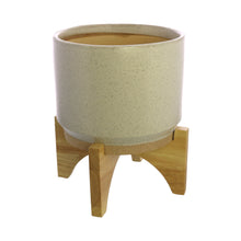 Load image into Gallery viewer, One HomArt Ames Cachepot in light gray with dark speckles throughout sitting on wooden stand against white background