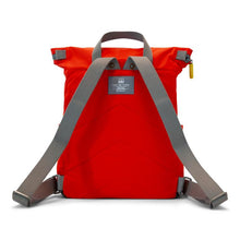 Load image into Gallery viewer, Back of red ORI backpack with gray straps and yellow zipper on white background