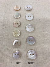 Load image into Gallery viewer, Image of two sets of round mother of pearl buttons on tan background. One set measures 1/2", other measures 5/8"